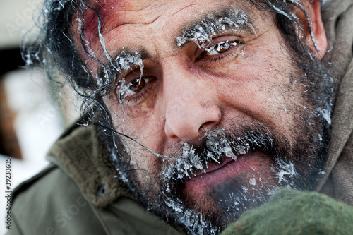 Fotografie Homeless winter frozen face