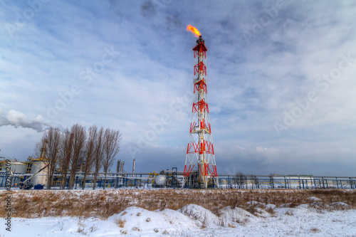 Chimneys of Polish oil rafinery in Gdansk at frosty winter