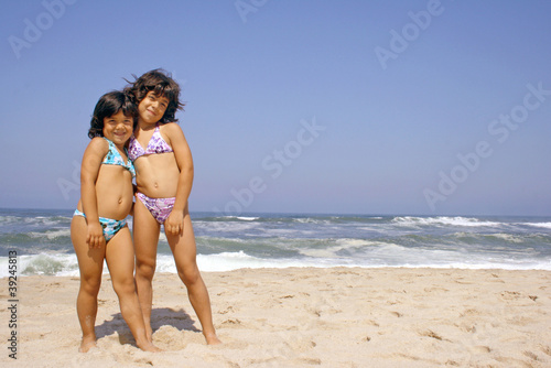 beautiful girl in bikini in the beach, summer photo