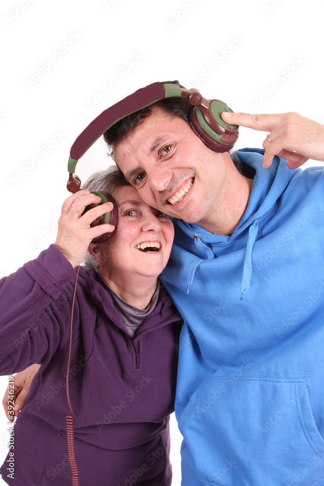 Man and mother enjoying music, studio photo Man and mother enjoying music, studio photo