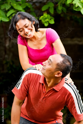 cheerful attractive ethnic couple portrait
