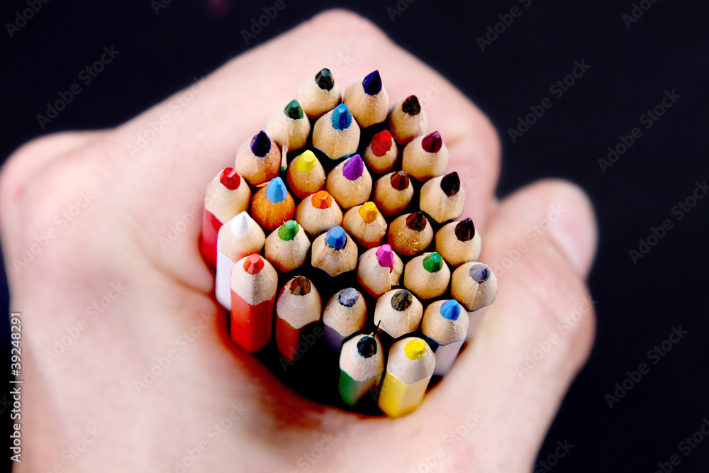 Assortment of coloured pencils with shadow on white/back backgro Assortment of coloured pencils with shadow on white/back backgro