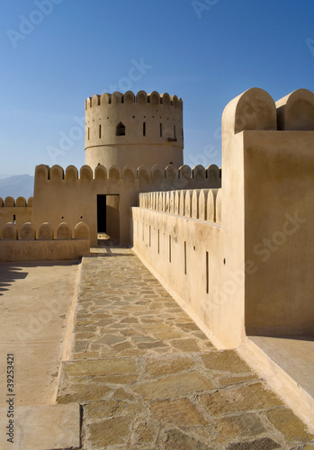 Historic adobe fortification, watchtower of Sunaysilah Castle or photo