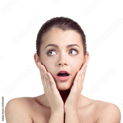portrait of surprised woman over white background