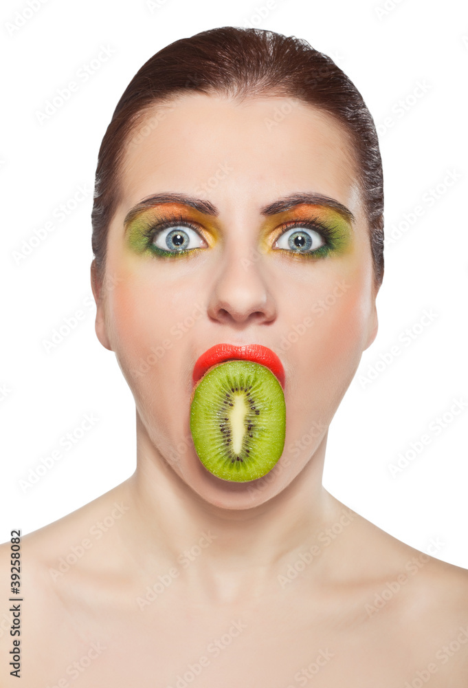 Young woman with kiwi