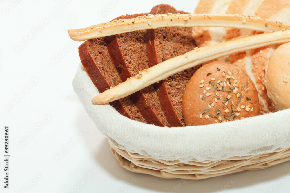 Fototapeta premium Fresh bread in the basket with copy space
