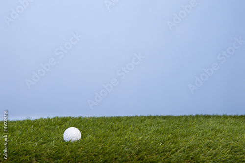 golf ball on grass field