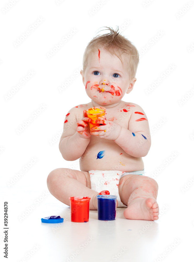 Happy dirty child with paints. Isolated on white background Happy dirty child with paints. Isolated on white background
