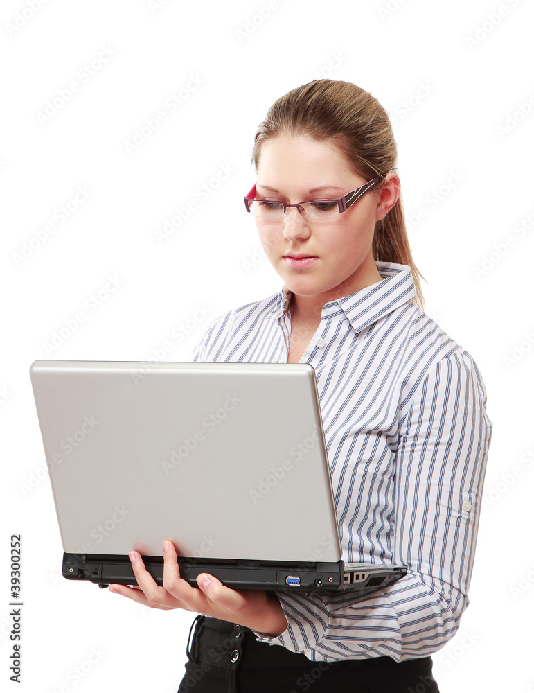 A young woman wearing glasses with a laptop A young woman wearing glasses with a laptop