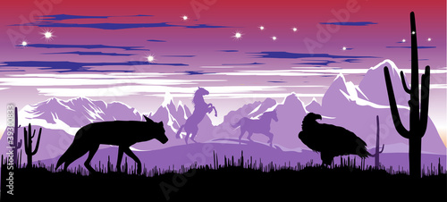 Wild horses and coyote in the steppes of Argentina