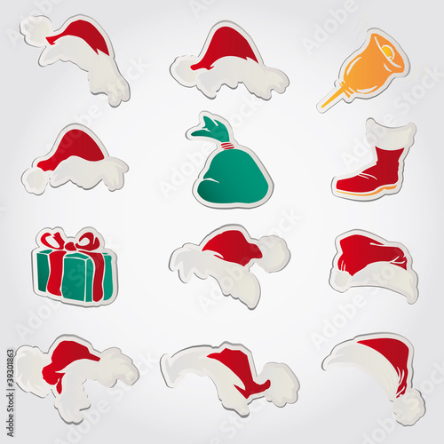 set of red santa hats and clothing and christmas icons