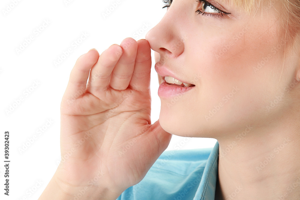 Obraz premium A young girl whispering something