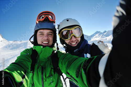 winter portrait of friends at skiing