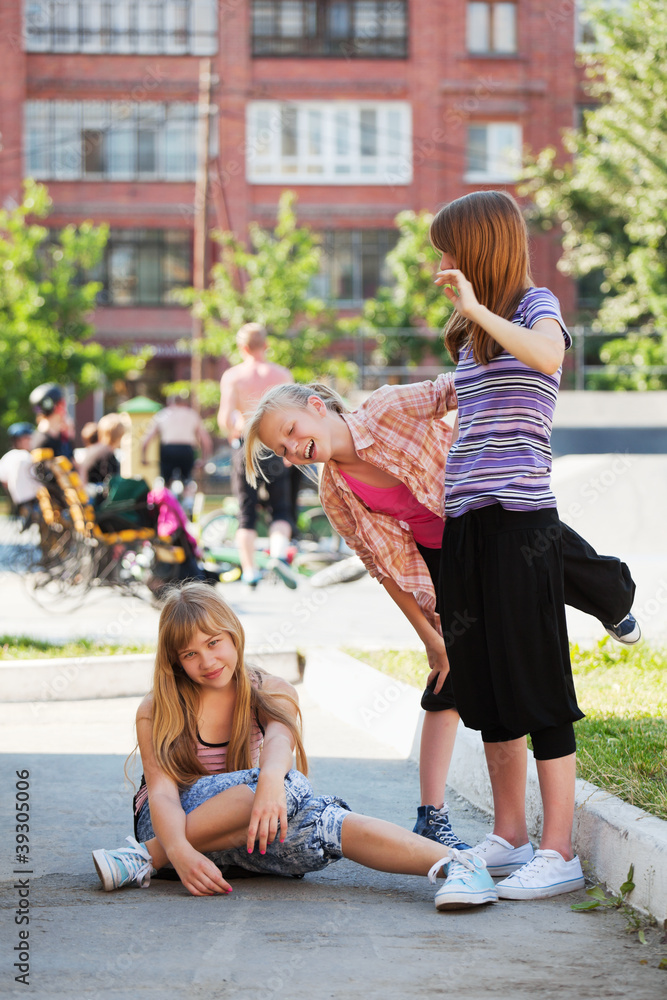 Teenage girls having fun on the playground Teenage girls having fun on the playground