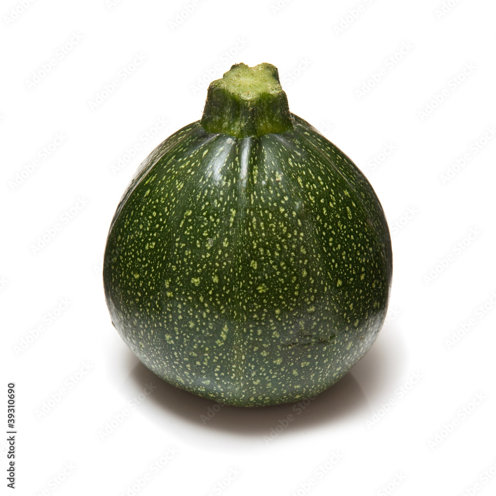 Globe courgette on a white studio background. Globe courgette on a white studio background.