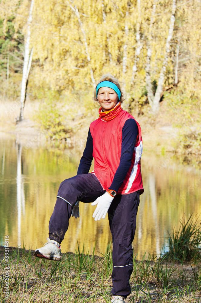 Woman making of the stretching in full nature