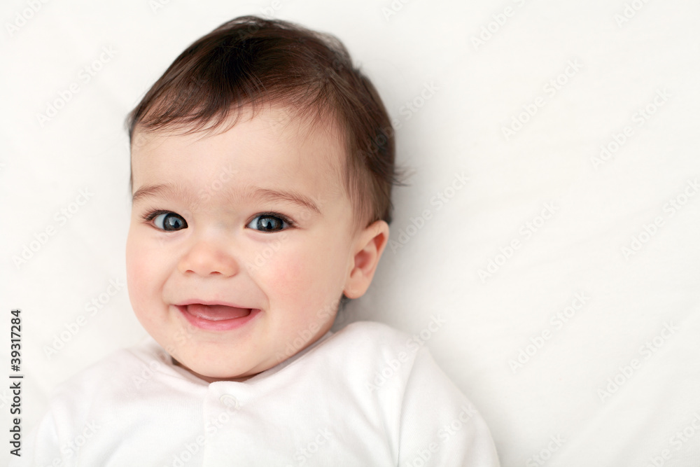 Gorgeous baby smiling to camera