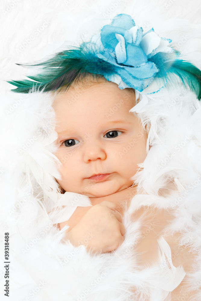 beautiful adorable baby with fashion flower in her hair beautiful adorable baby with fashion flower in her hair