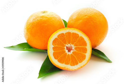 Oranges Whole and Cross Section on Leaves