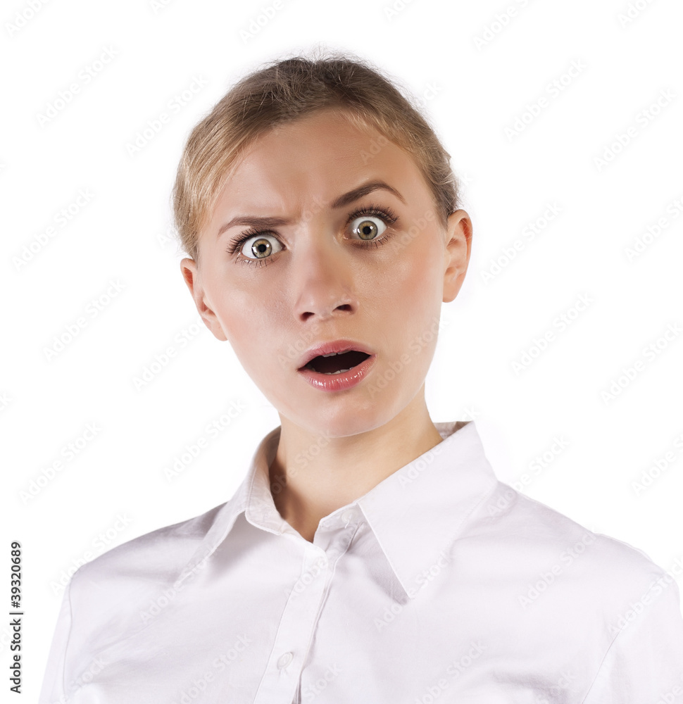 Surprised girl pointing at copy space Surprised girl pointing at copy space