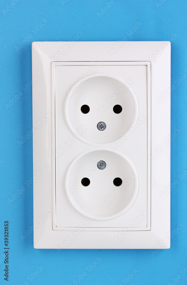 White electric socket on the wall White electric socket on the wall