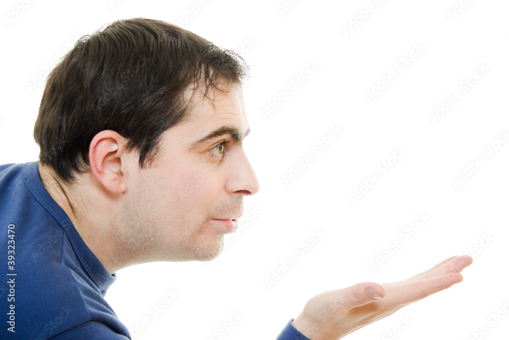 A man sends a air kiss on a white background. A man sends a air kiss on a white background.