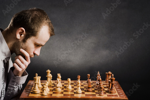 Man at chess board