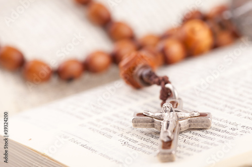 rosary on holy bible