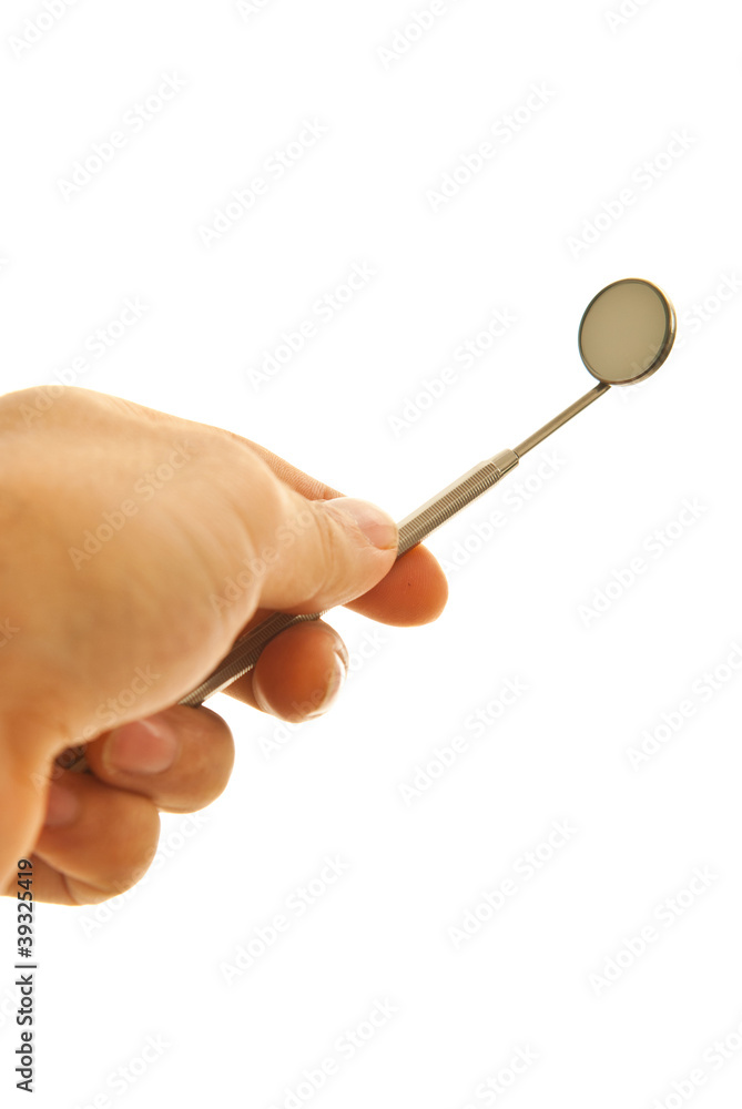 Hand holding mirror dental tool Hand holding mirror dental tool