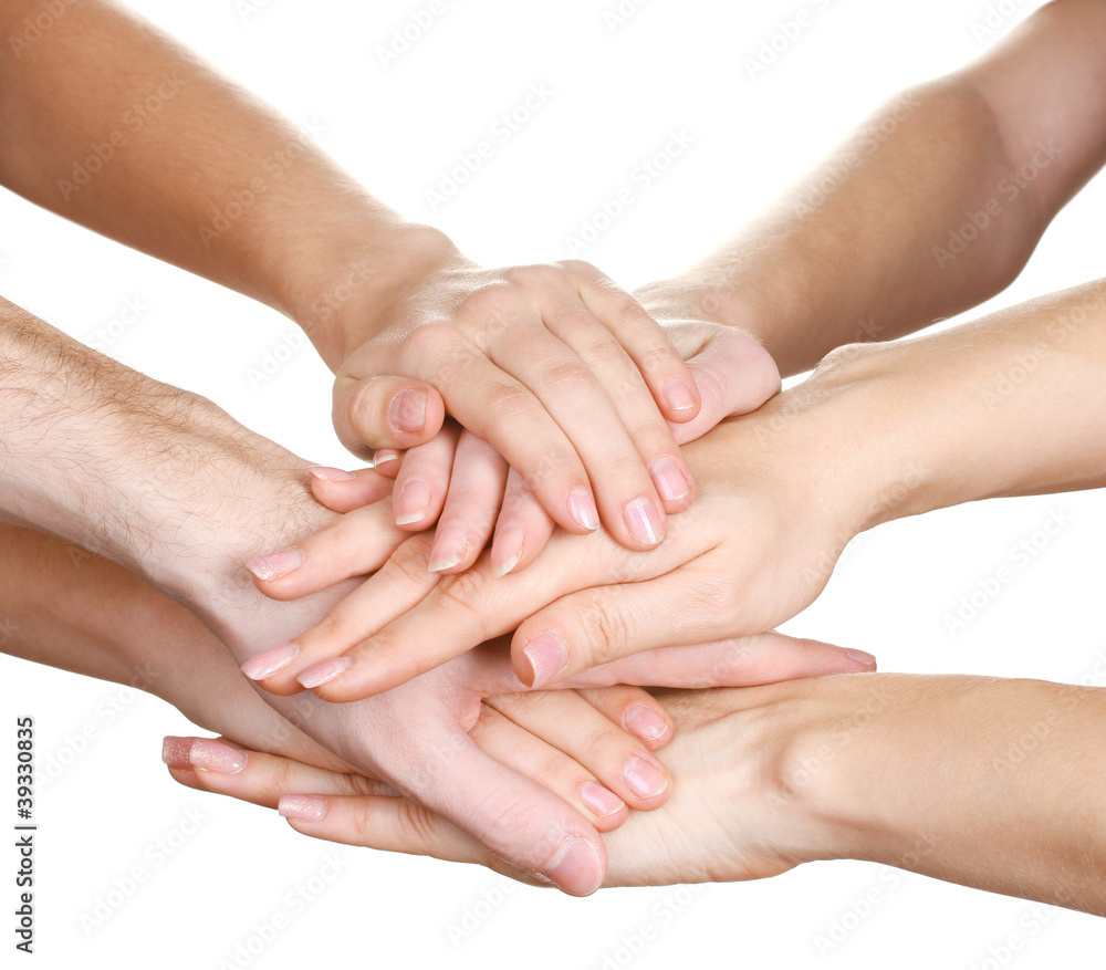 group of young people's hands isolated on white group of young people's hands isolated on white