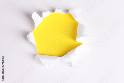 Torn paper with yellow background