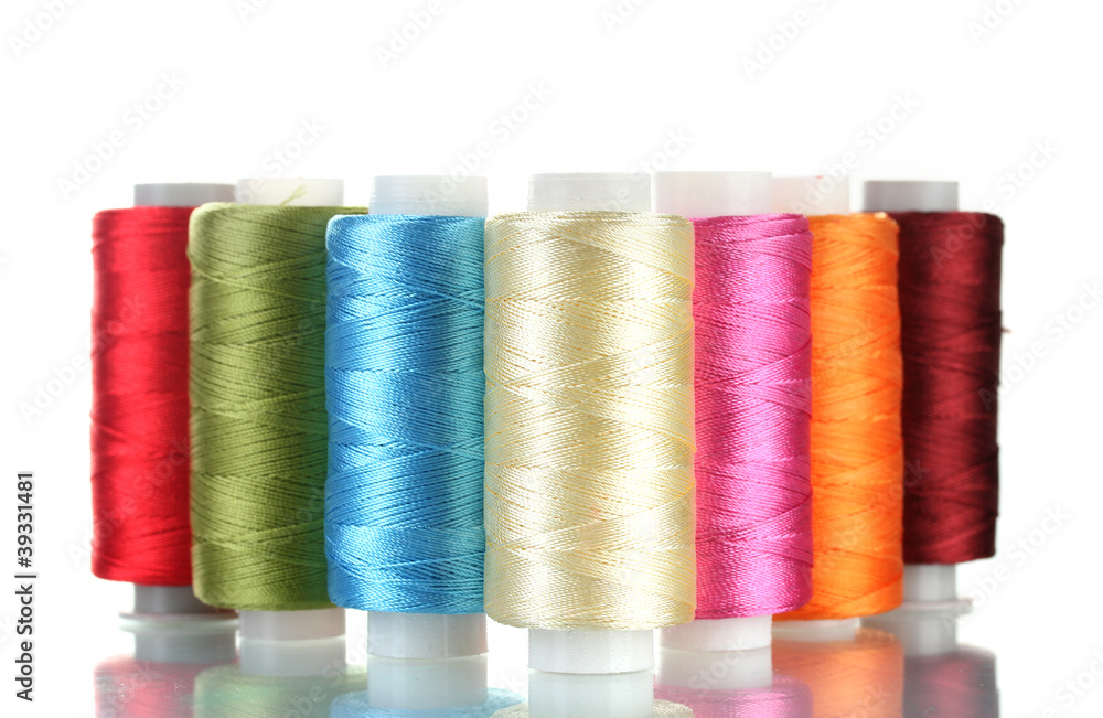 bright bobbin thread isolated on white. bright bobbin thread isolated on white.