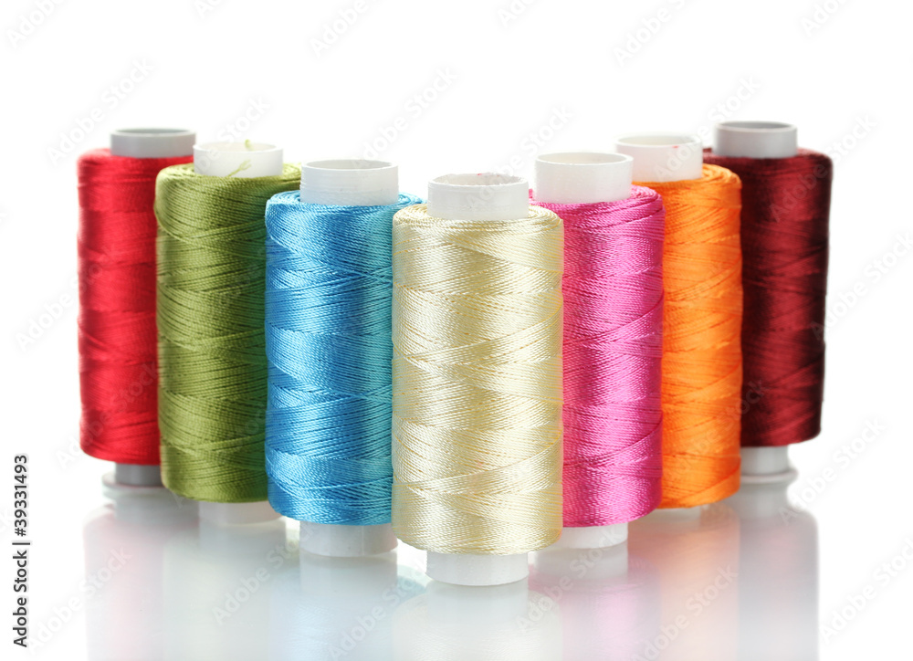 bright bobbin thread isolated on white. bright bobbin thread isolated on white.