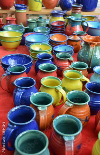 Colorful hand-made pottery for sale at outdoor market
