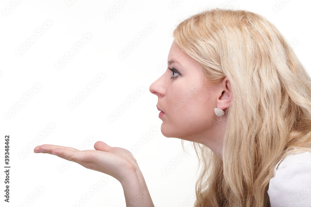 beautiful young woman blowing a kiss beautiful young woman blowing a kiss