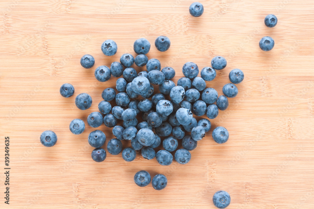 Fresh blue berries group on wooden back Fresh blue berries group on wooden back