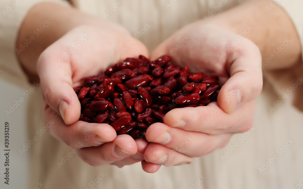 man holding ed kidney beans. Concept - Simple Life. man holding ed kidney beans. Concept - Simple Life.