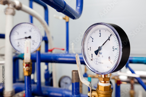 Closeup of a pressure meter on a machine