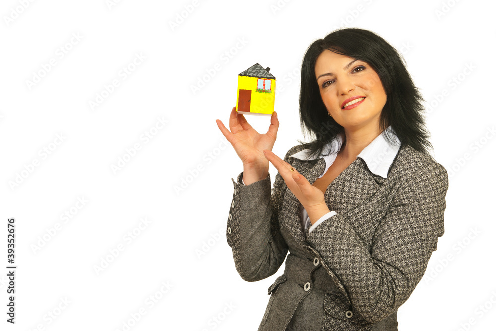 Real estate showing a miniature house Real estate showing a miniature house