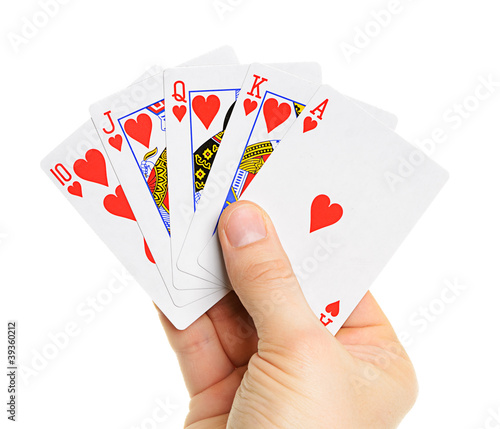 Playing cards in hand photo