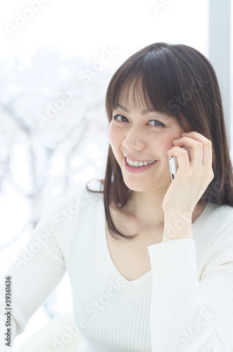 Young woman talking with smart phone