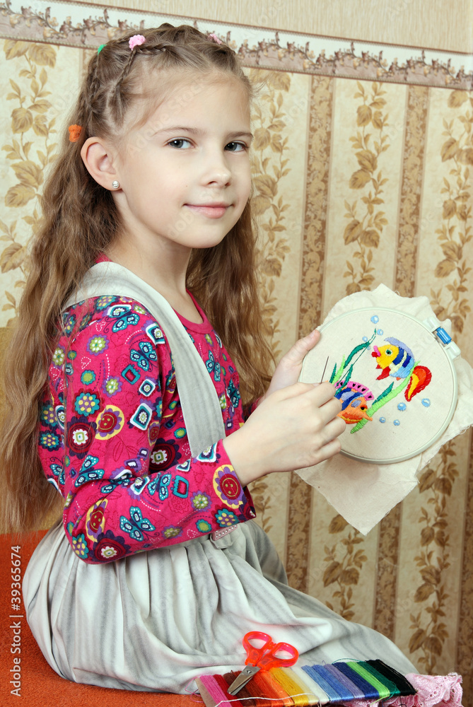 The girl embroiders Figure