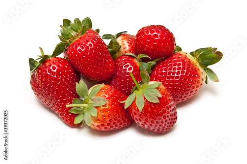 Strawberries isolated on a white studio background.