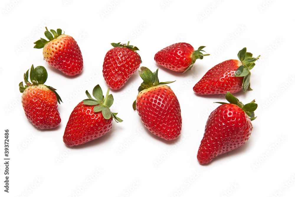 Strawberries isolated on a white studio background. Strawberries isolated on a white studio background.