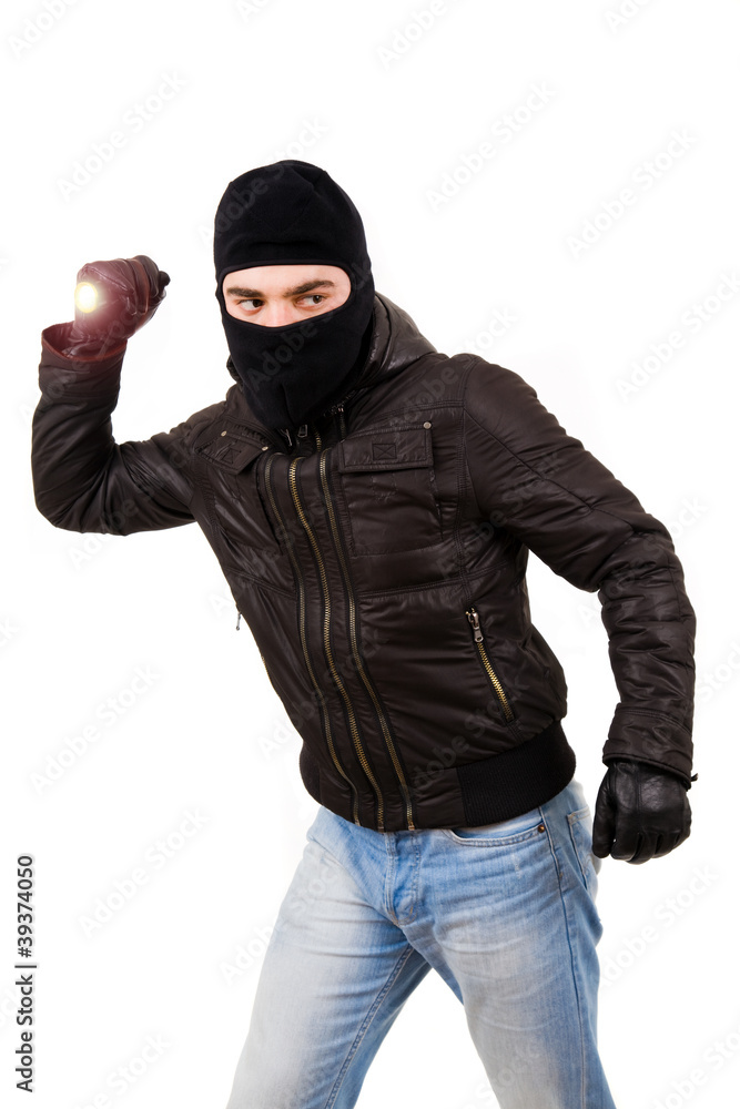 Thief with flashlight isolated in white Thief with flashlight isolated in white