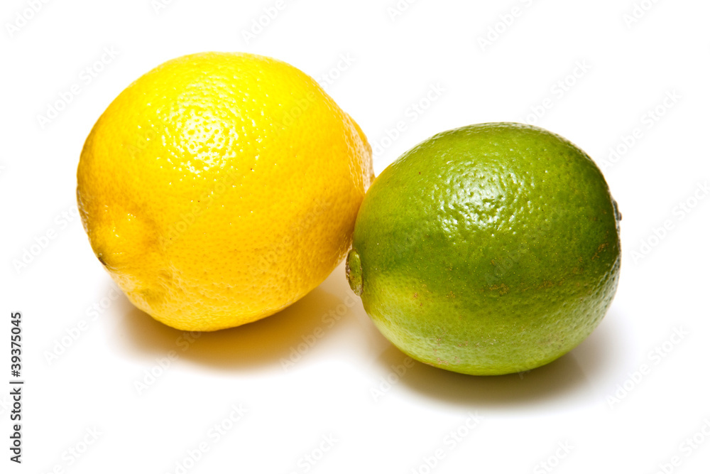 Lemons and Limes isolated on a white studio background. Lemons and Limes isolated on a white studio background.