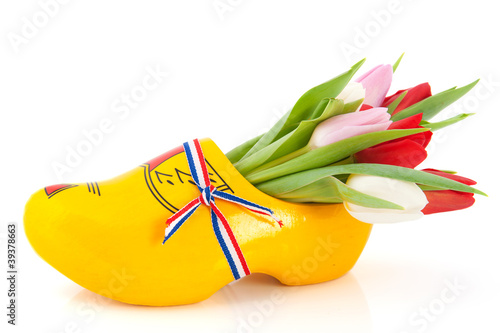 Fototapeta Naklejka Na Ścianę i Meble -  Dutch wooden clogs with tulips