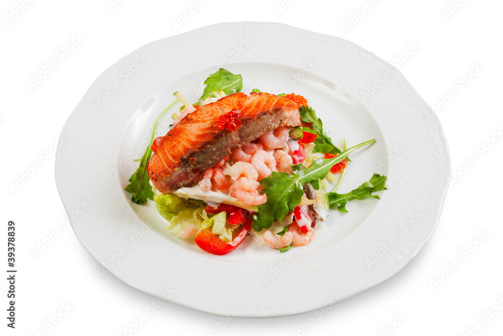 pork chop with a slice of salmon on top, garnished with shrimp a pork chop with a slice of salmon on top, garnished with shrimp a