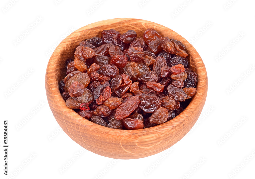 Raisin in wooden bowl, isolated on white background Raisin in wooden bowl, isolated on white background