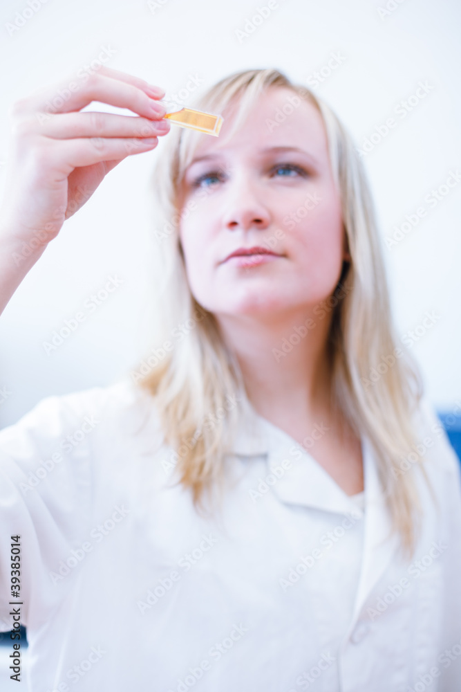 Closeup of a female researcher/chemistry student Closeup of a female researcher/chemistry student
